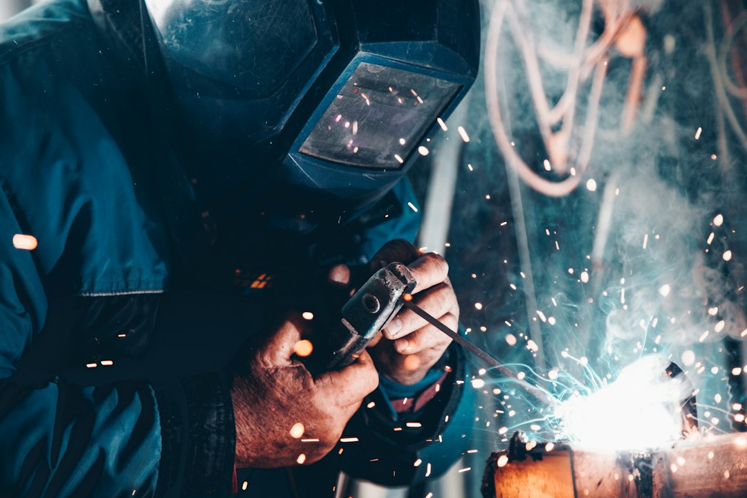 Modern welder at work; contextual image for a historical story about women welders during World War II.